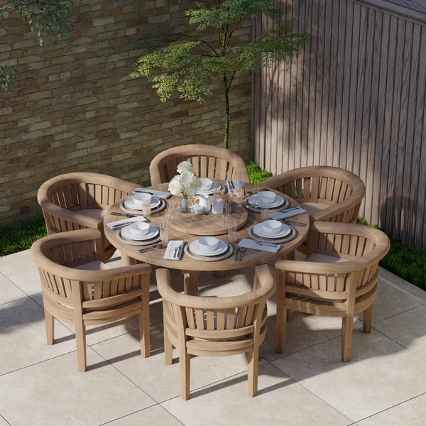 Teakhouten tuinset bestaande uit een ronde Maximus-tafel van 150 cm met een blad van 4 cm dik, 6 San Francisco-stoelen en gratis kussens.