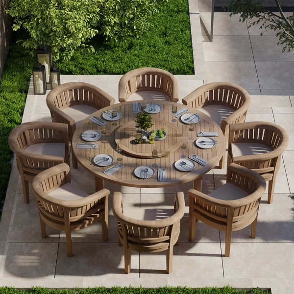 Teakhouten tuinset bestaande uit een ronde Maximus-tafel van 180 cm met een blad van 4 cm dik, 8 San Francisco-stoelen en gratis kussens.