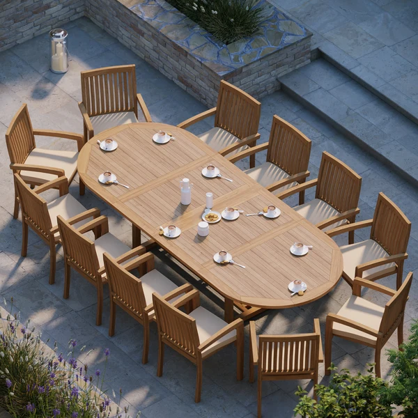 Gigantische ovale teakhouten set van 200-300 cm met uitschuifbare tafelblad van 4 cm en 12 stapelbare Henley-stoelen, inclusief gratis kussens.